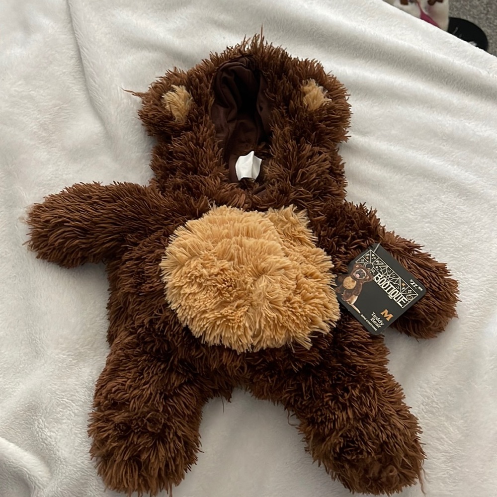 M teddy bear dog costume. It was too small for my mini golden doodle (25lb)